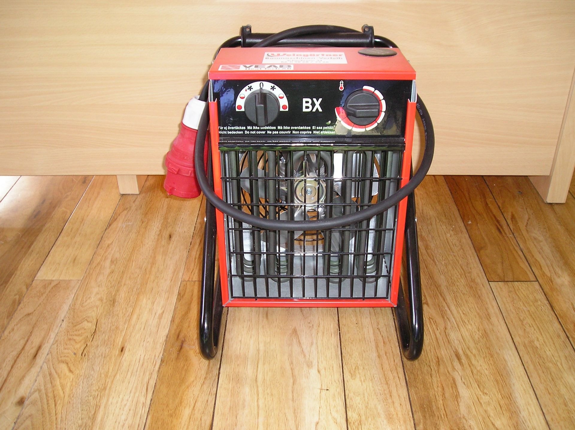 Weingärtner Baumaschinen – Bauheizer BX15E auf Holzboden