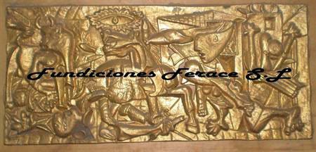 Una talla de oro de un grupo de personas con las palabras fundiciones ferace sl