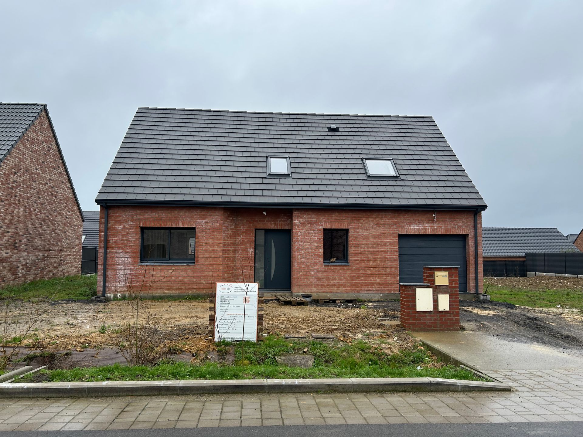 Construction de maison avec garage et combles aménagés