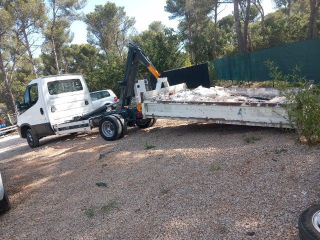 Remorquage d'une benne plate