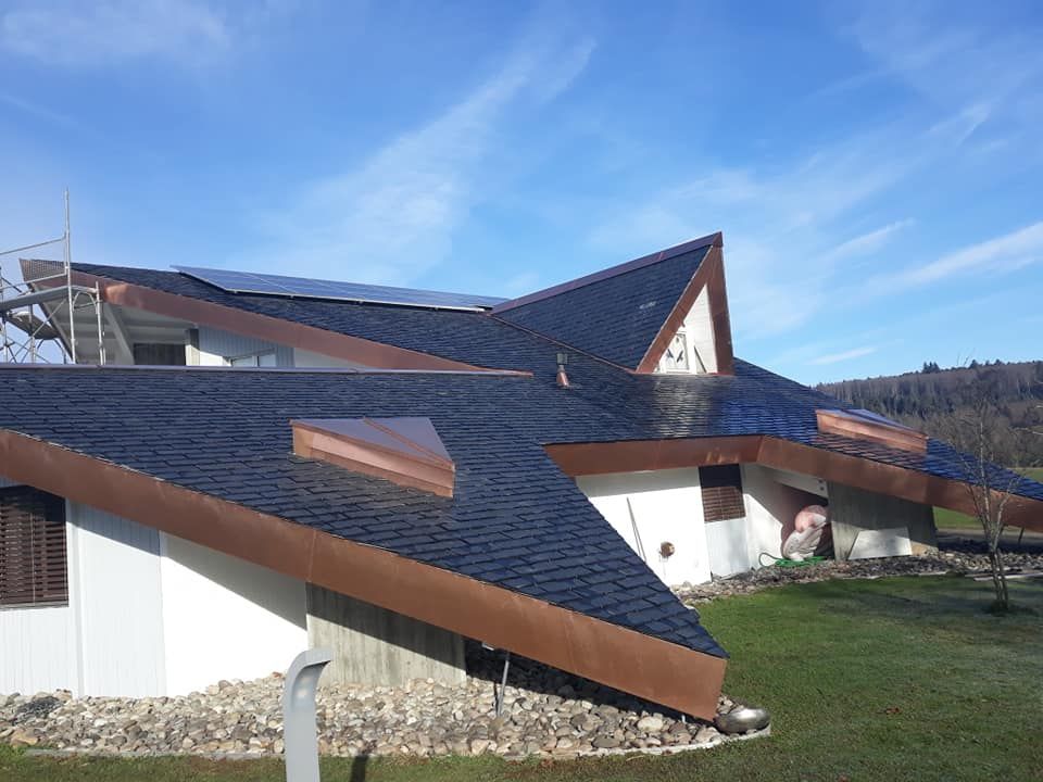 Revêtement de toit et éléments de ferblanterie