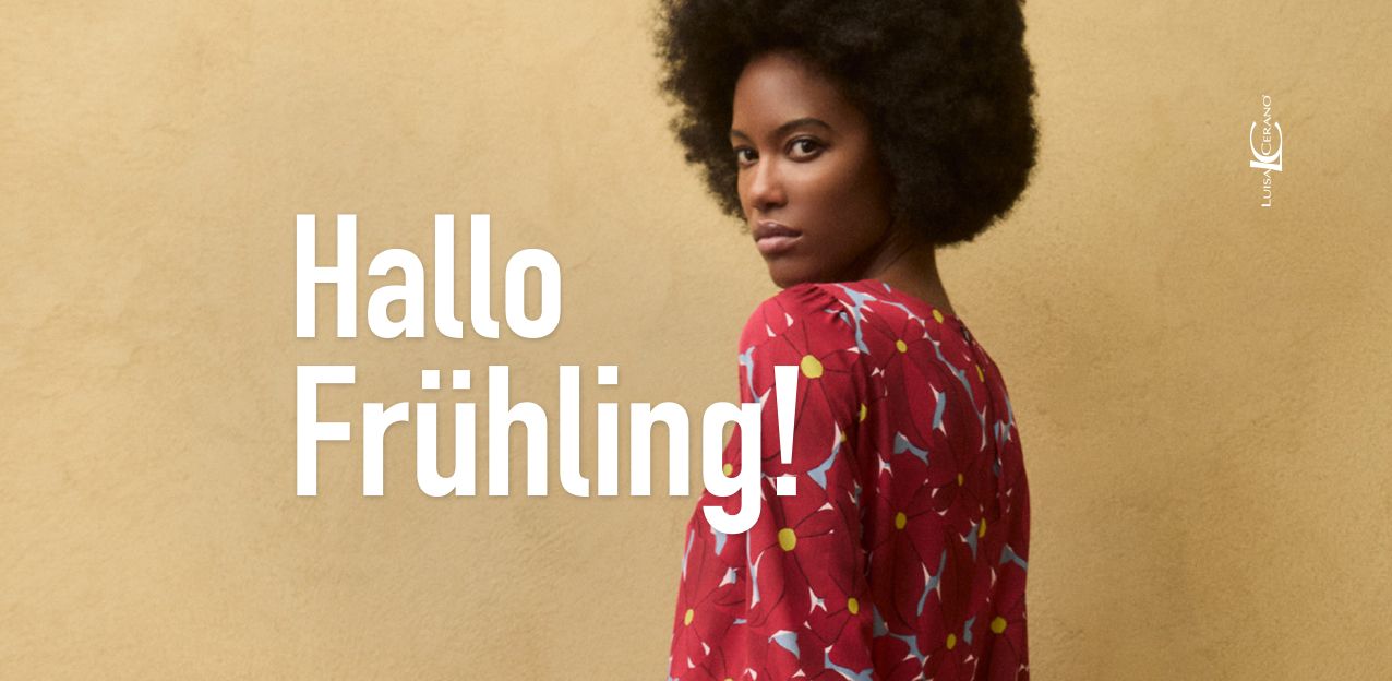 Frau in grüner Kleidung bietet 30-50% Rabatt an.