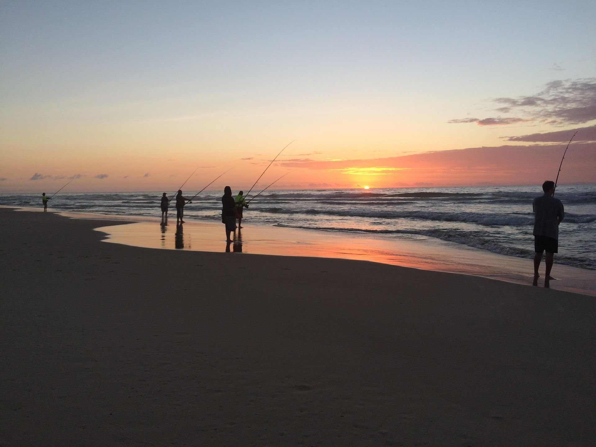 fisherman on k'gari at sun rise