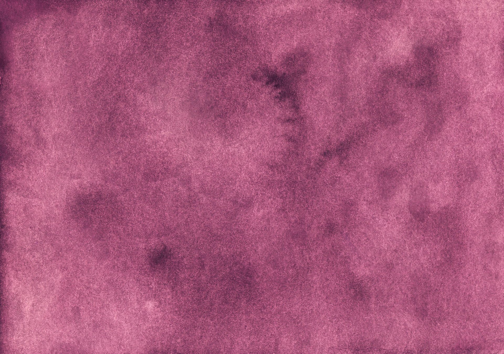 Fondo de acuarela abstracta en tonos burdeos y rosa.
