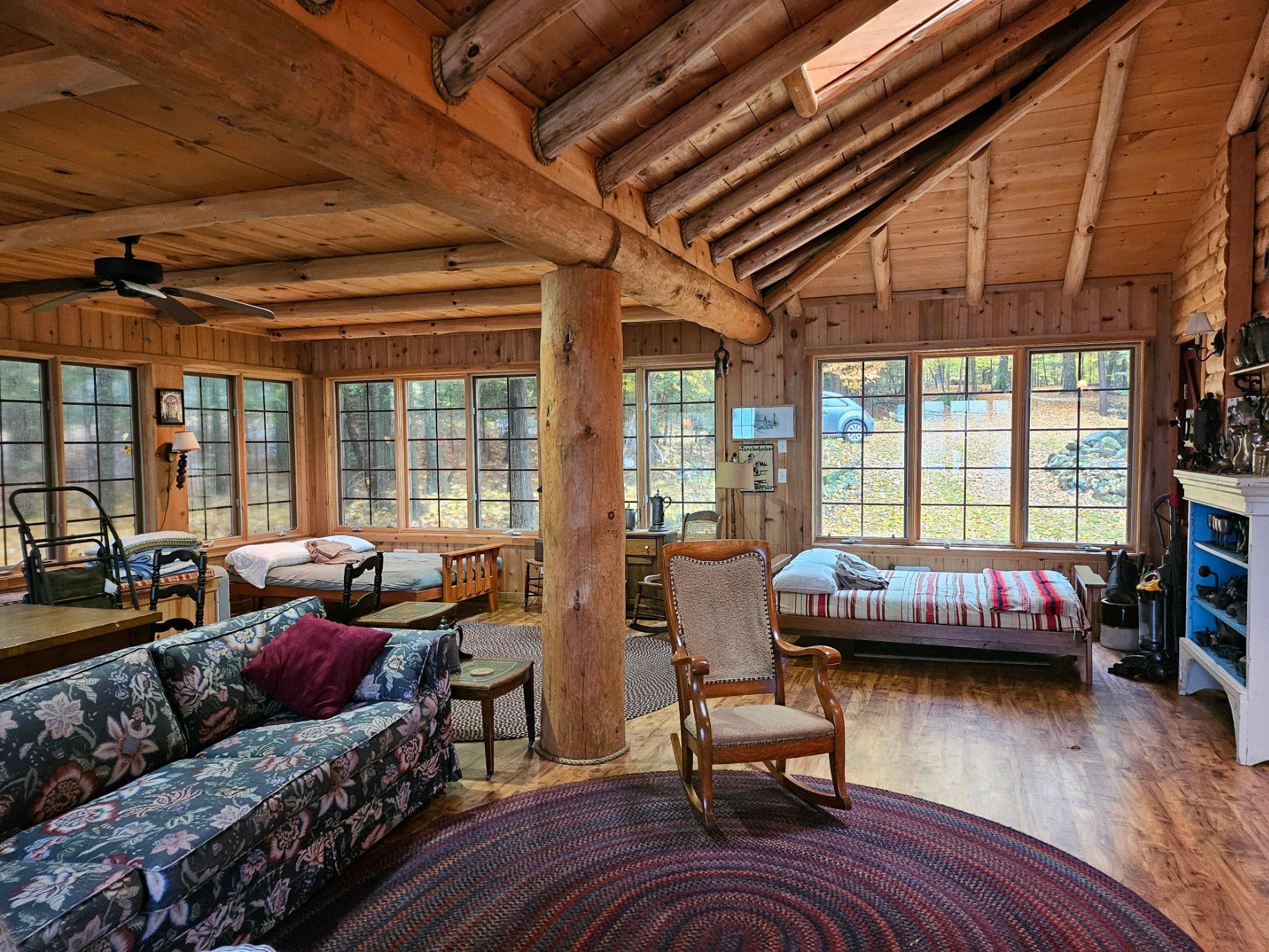 Cozy interior of cabin with wood furniture and natural light from windows