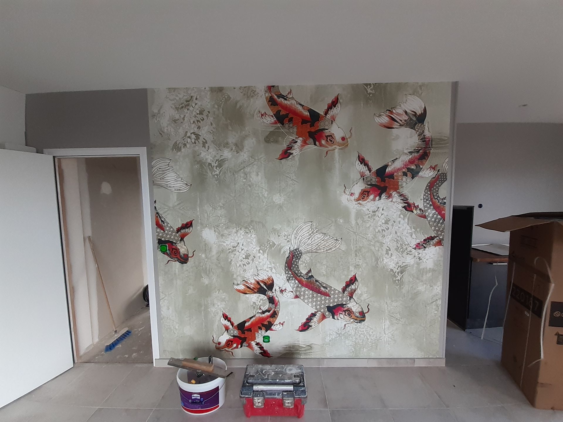 Tapisserie avec des carpes koï