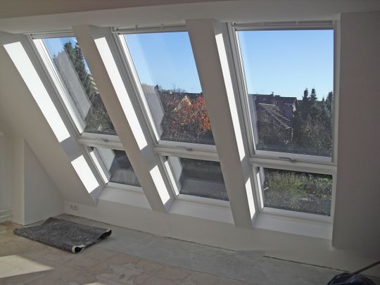 Drei Dachwohnraum-Fenster