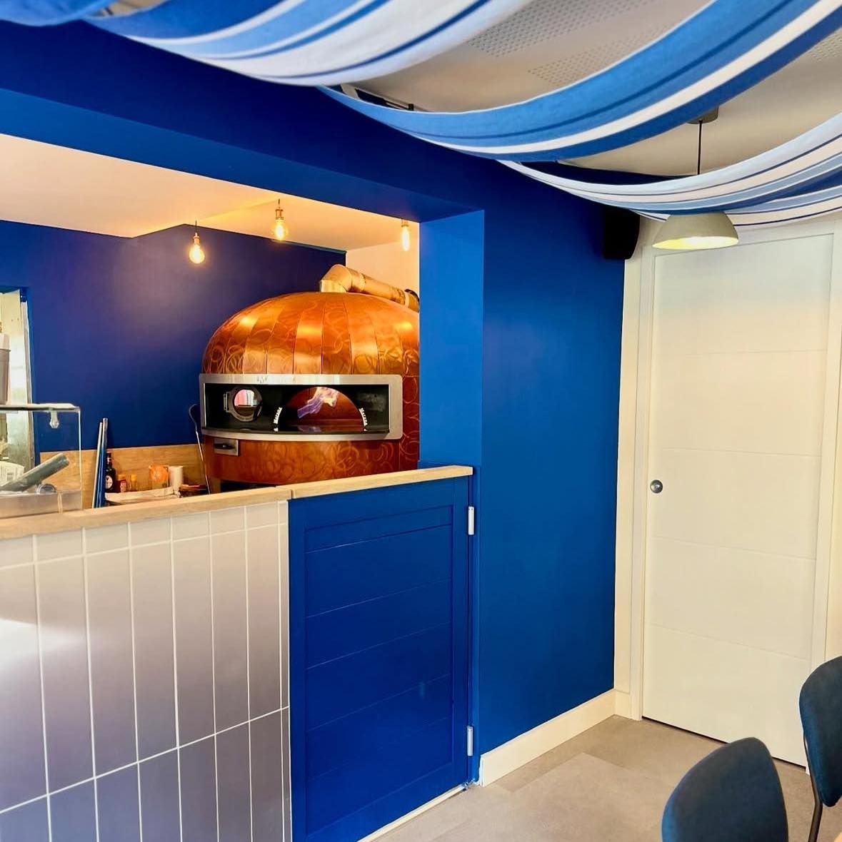 Le four à bois de Pizzeria Rimini.