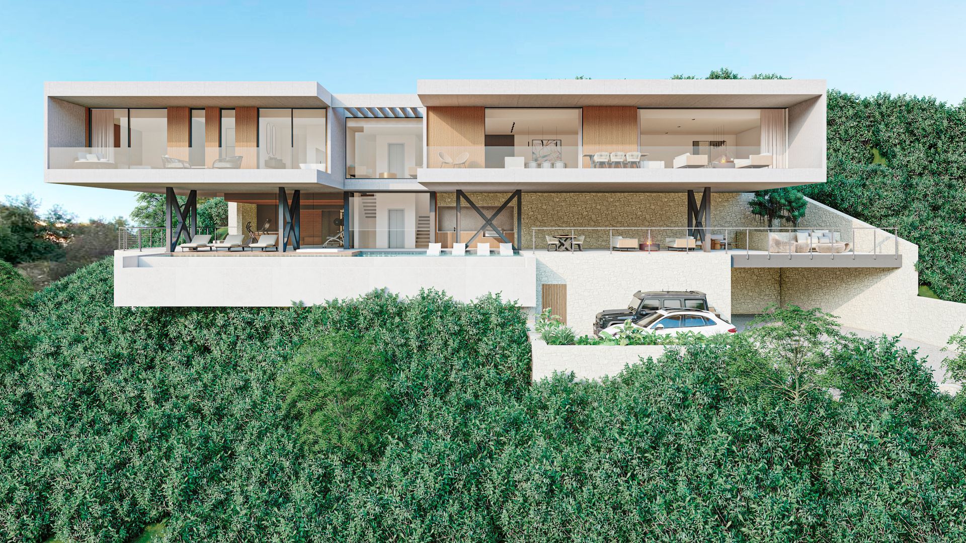 Una casa grande está situada en la cima de una colina rodeada de árboles.