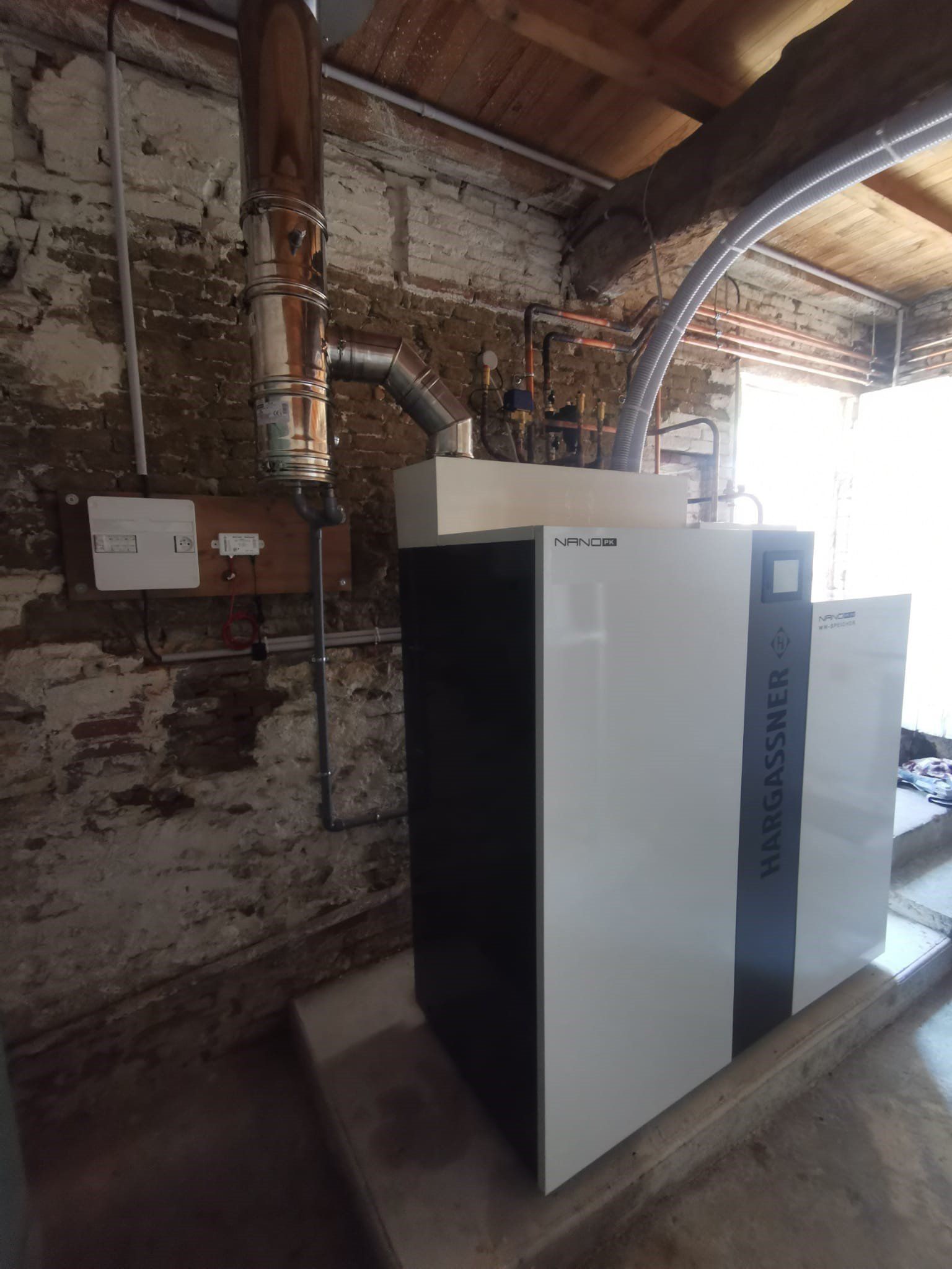 installation d'une chaudière à granulés de la marque Hargassner