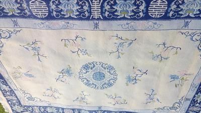 Tapis blanc après nettoyage