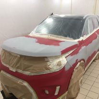 Travaux de carrosserie sur un véhicule Suzuki