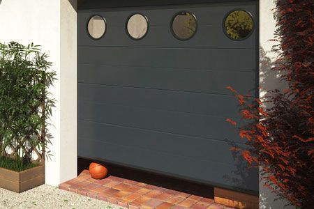 Porte de garage sectionnelle avec hublot