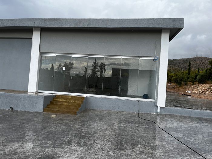 Πτυσσόμενες πόρτες  - KAMERI GLASS