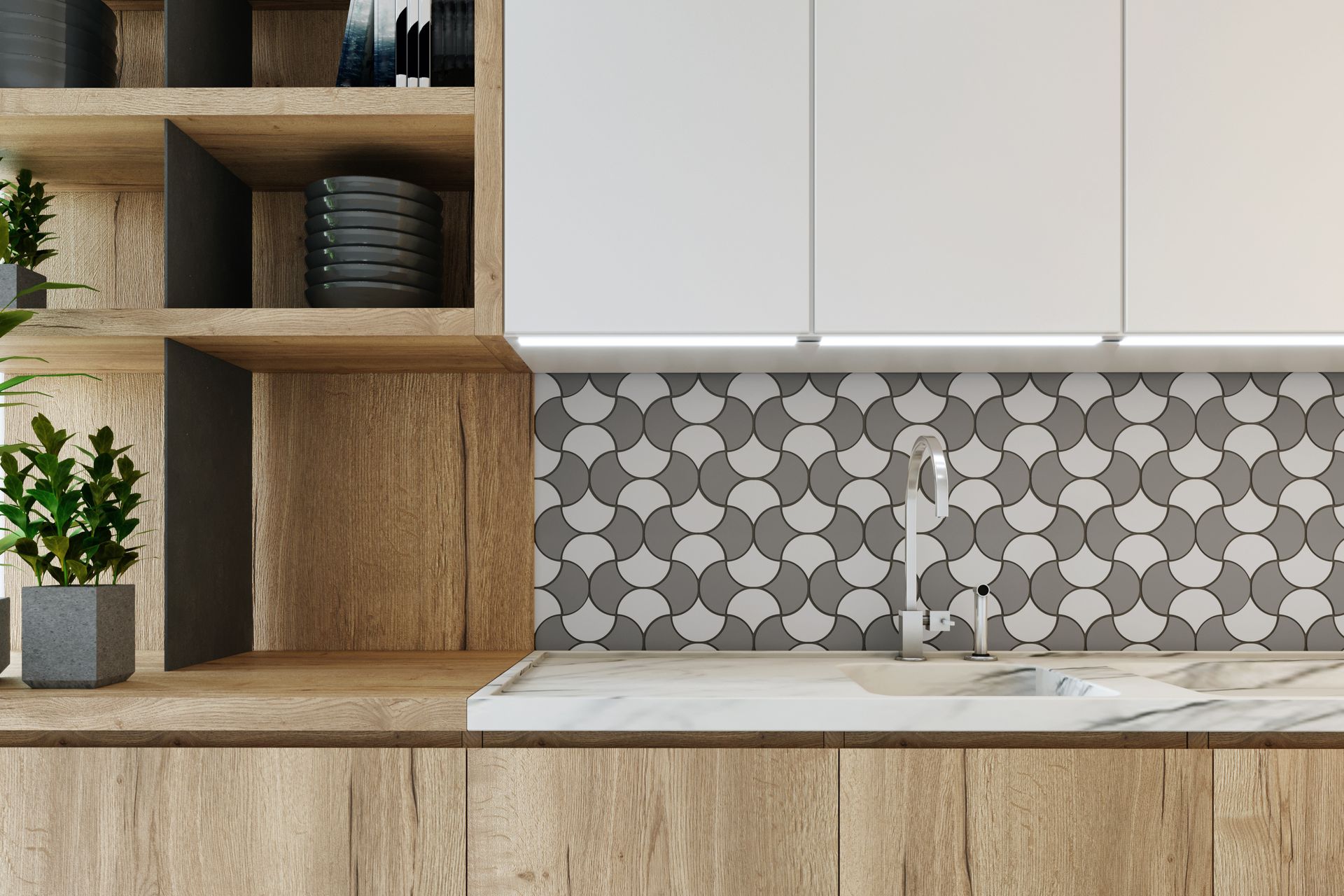 Cuisine moderne avec crédence en mosaïque blanc et gris.