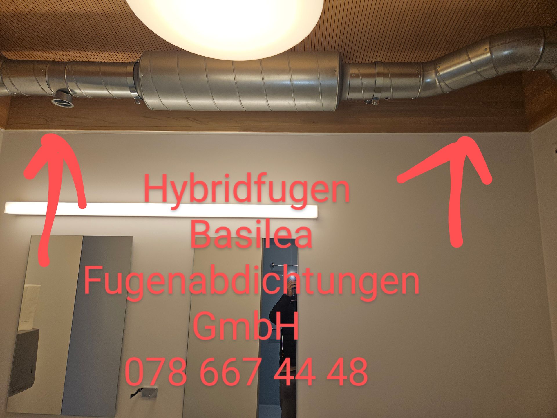 A sign that says hybridfugen basilea fugenabdichtungen gmbh
