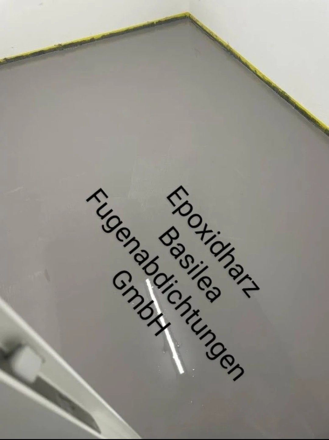 A piece of paper that says epoxidharz basilea fugenabdichtungen gmbh