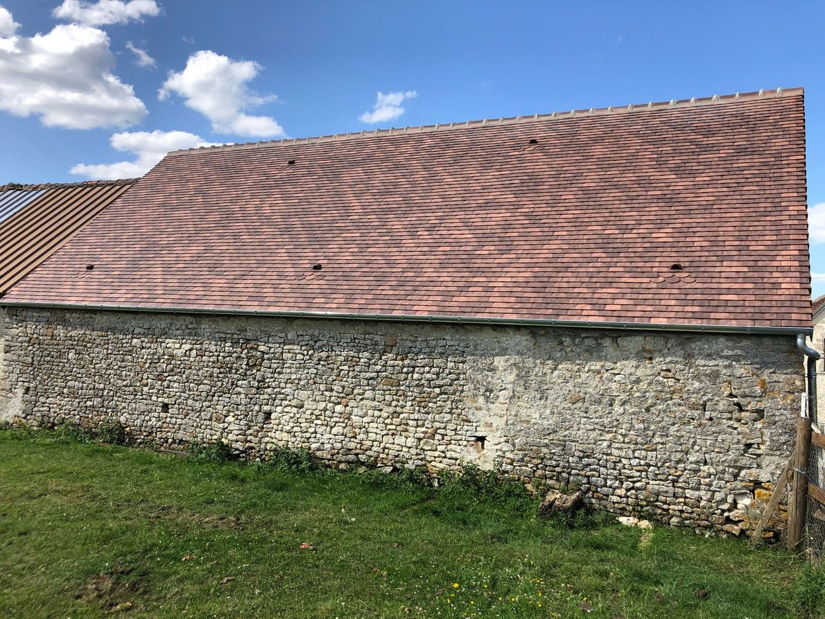Une toiture neuve avec la maison