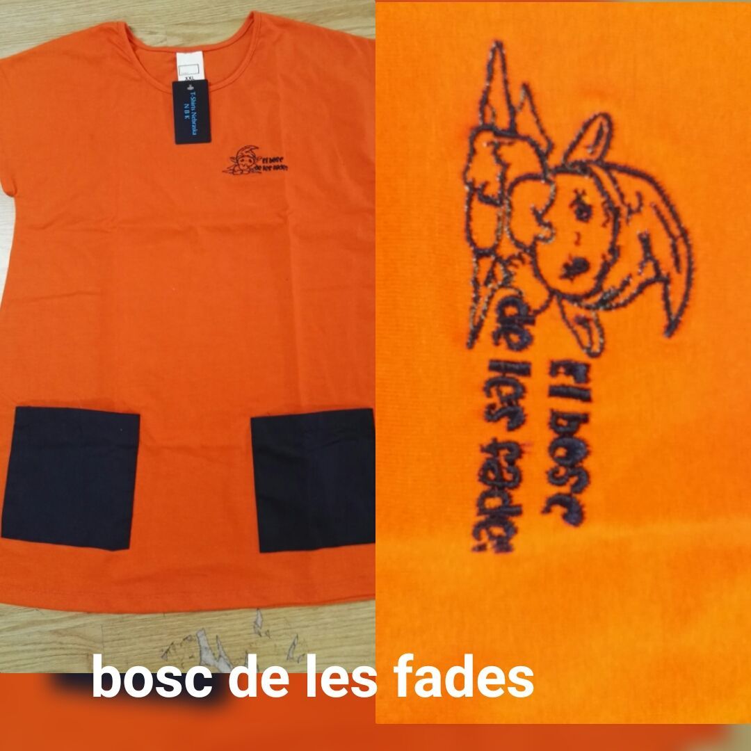 Una camiseta naranja con la palabra bosc en ella