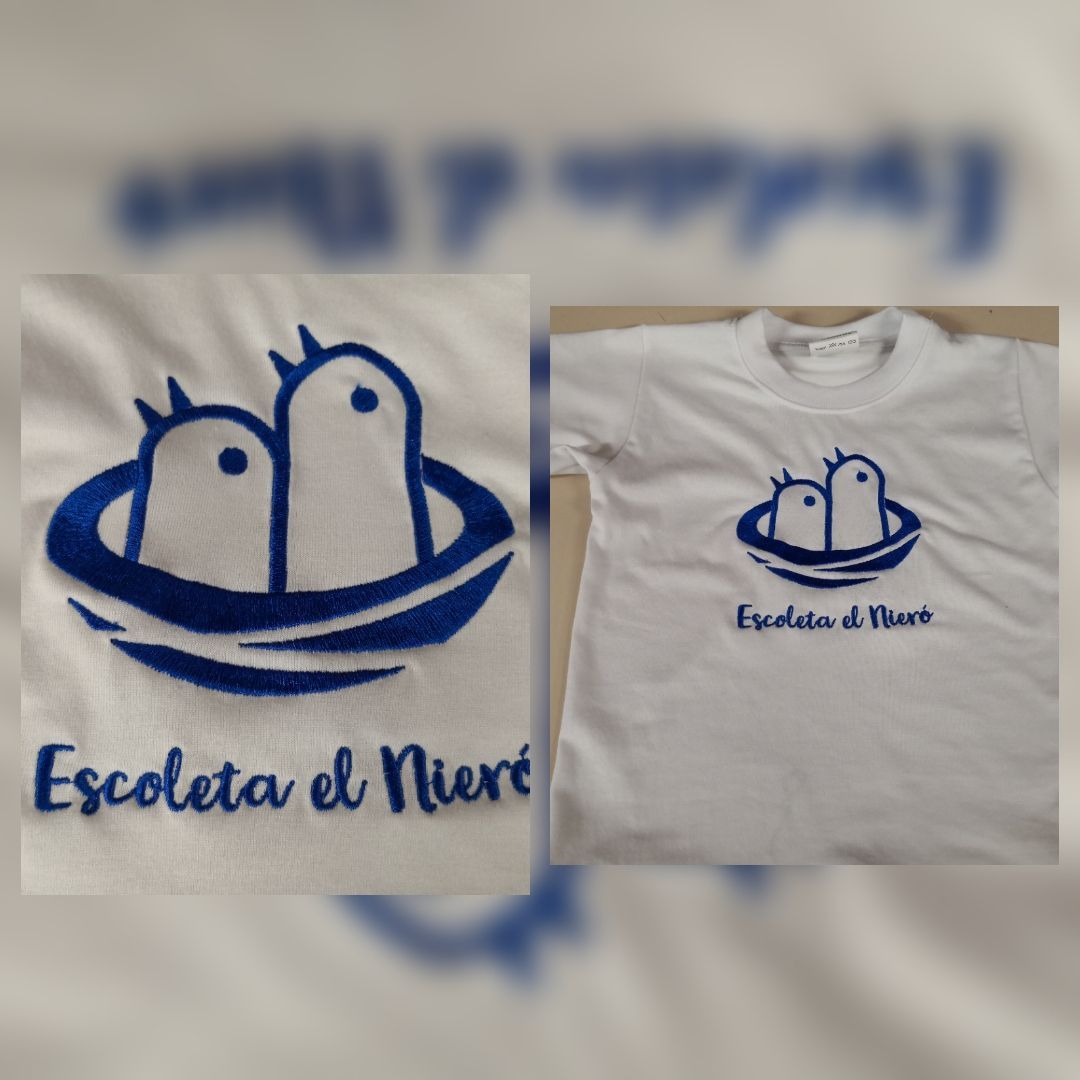 Una camiseta blanca que dice escoleta el nierre