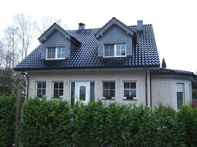 Einfamilienhaus mit Dach von Kurowski GmbH