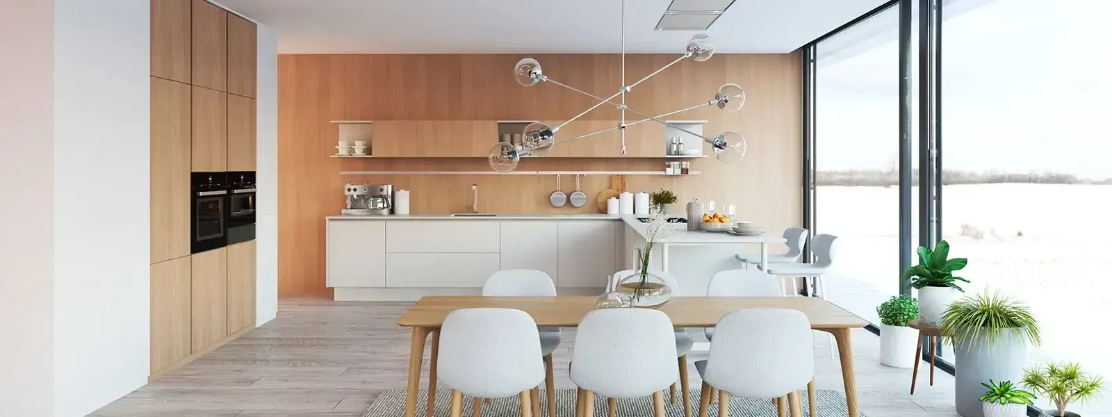 Una cocina con mesa de comedor y sillas y una gran ventana.