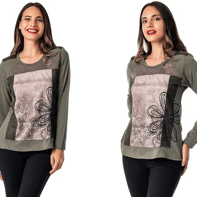 Una mujer que lleva una camisa verde con una flor.