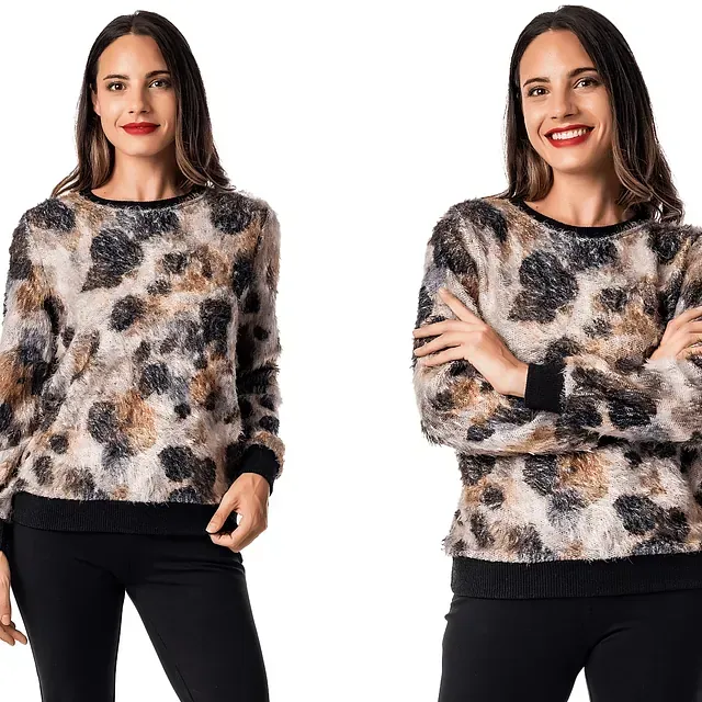 Una mujer que lleva un suéter con estampado de leopardo y pantalones negros.