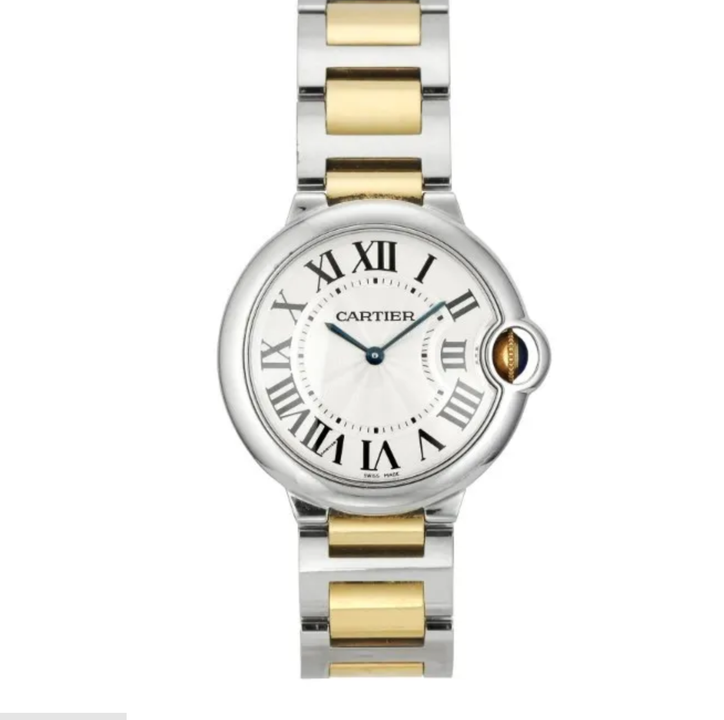 Une montre Cartier en or et argent.