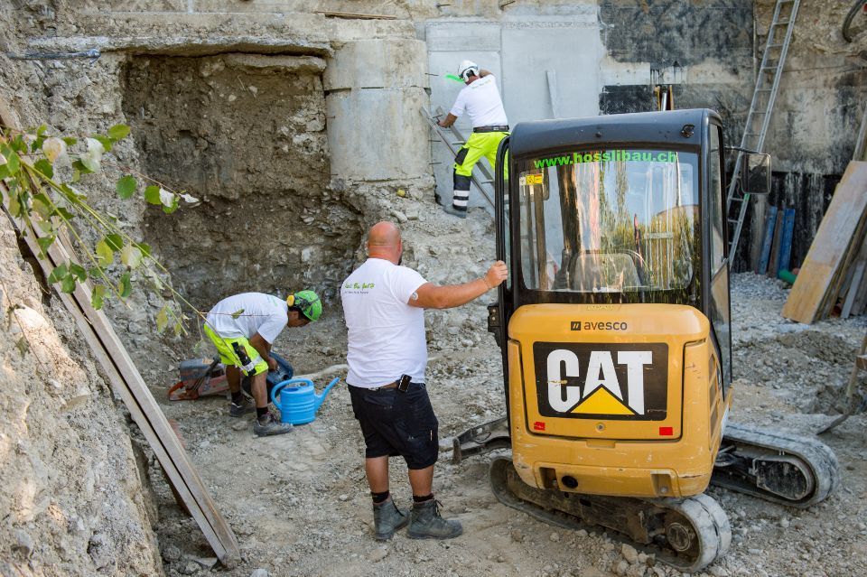 Mitarbeiter der Hossli Bau GmbH beim Bau