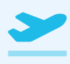Ein blaues Flugzeug hebt von der Startbahn eines Flughafens ab.