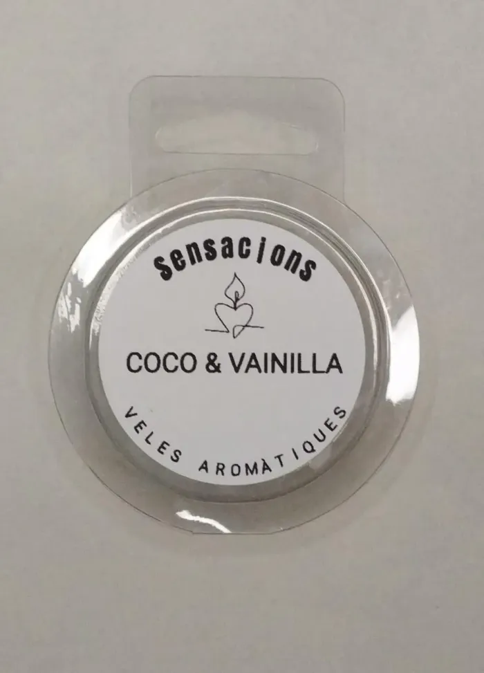 Etiqueta redonda en blanco y negro del producto “Sensa' tons” con aroma a coco y vainilla.