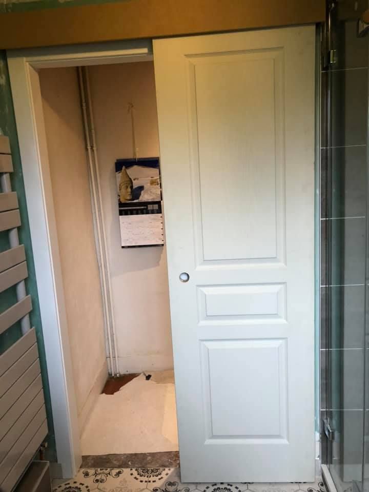 Porte coulissante en bois