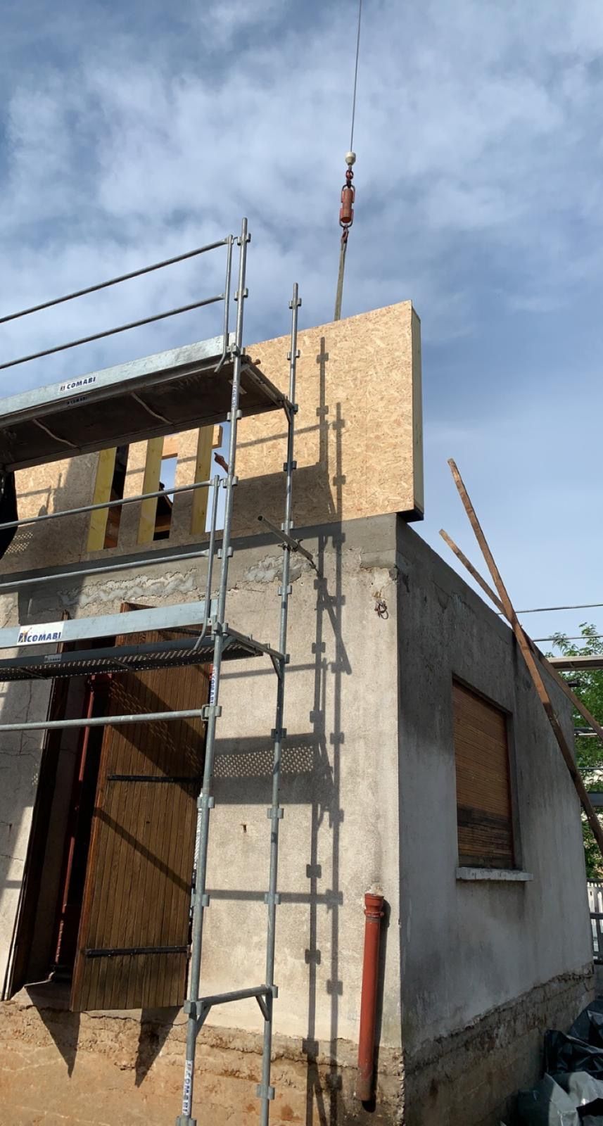 Travaux de construction d'un étage supplémentaire