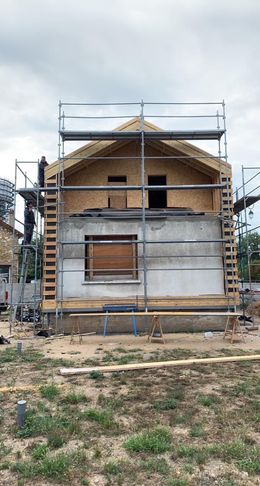 Agrandissement d'une maison avec l'ajout d'un étage supplémentaire