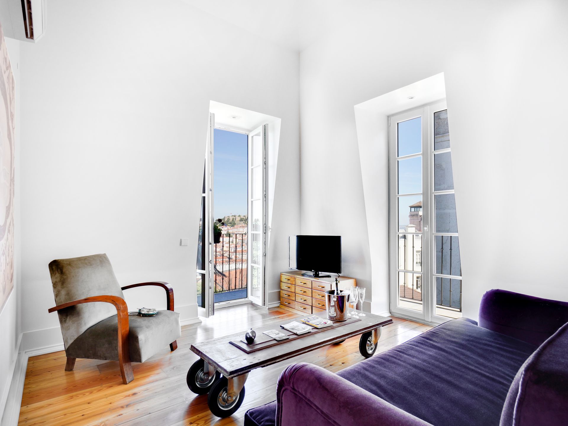 Bright workspace with natural light and a view in a spa penthouse two-bedroom apartment.