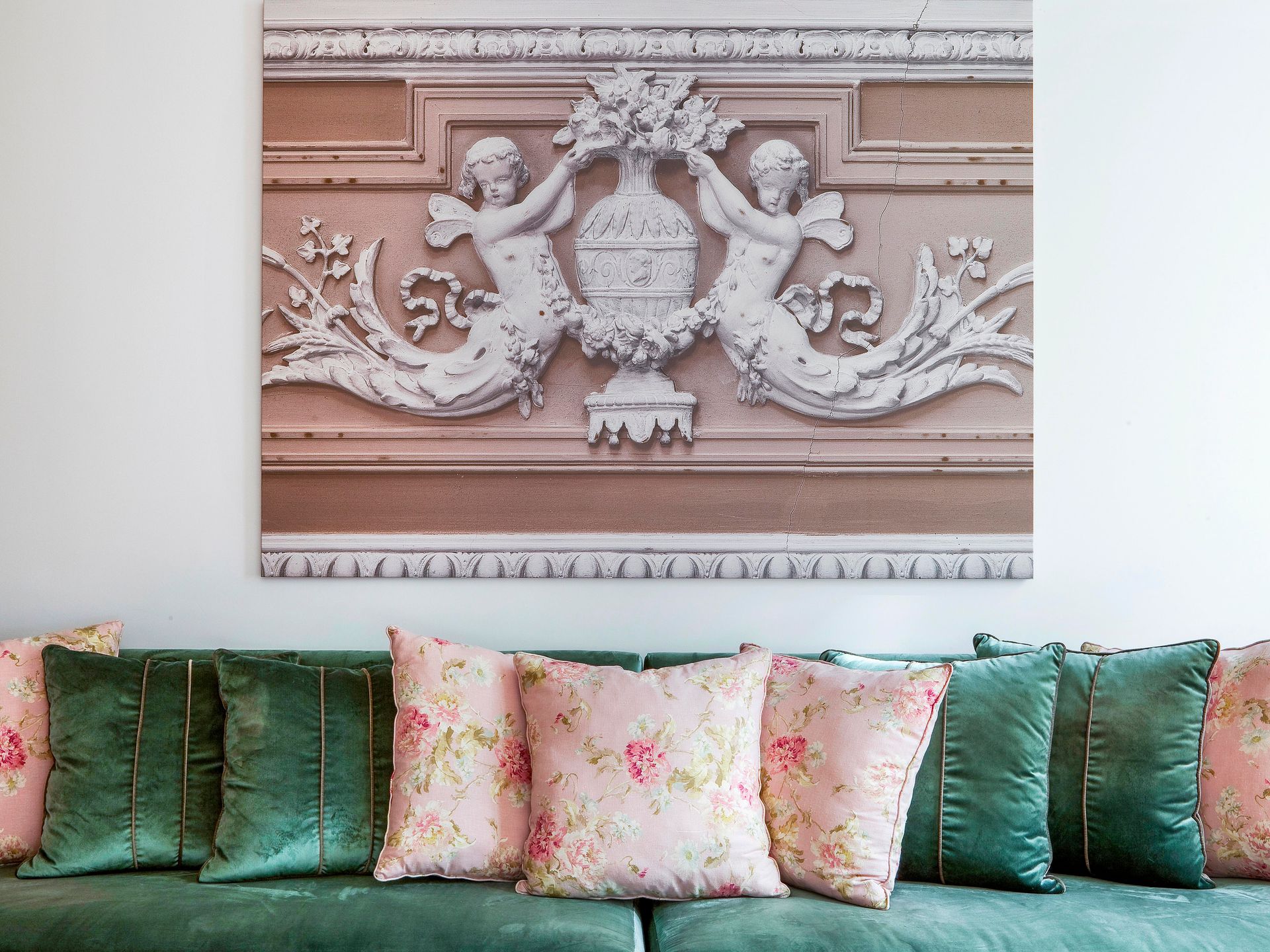 Elegant artwork and floral cushions in a deluxe one-bedroom apartment