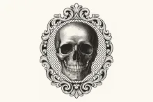 Cráneo en marco ovalado adornado.