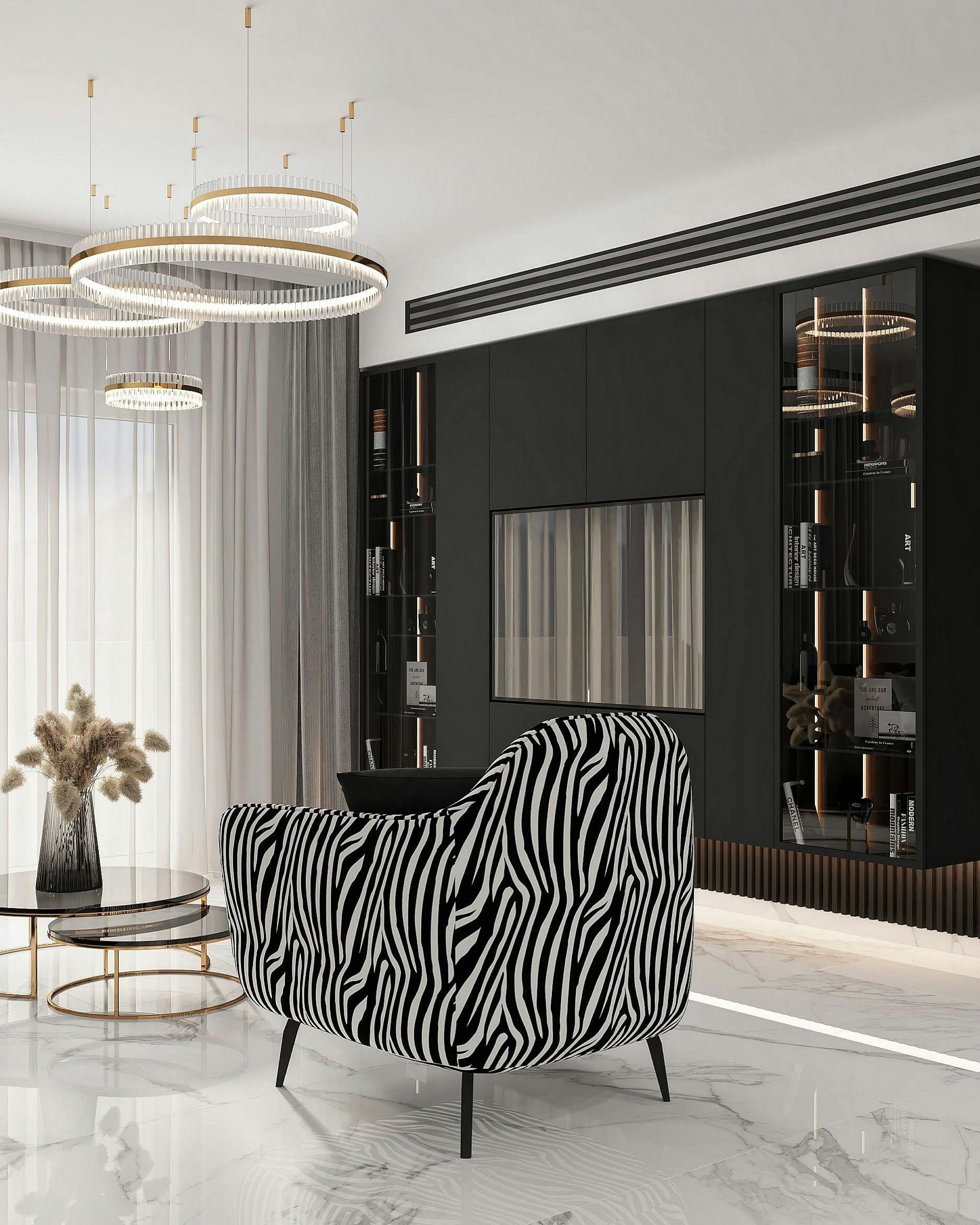 Modern living room with black-and-white striped chair, black wall unit, and gold chandelier fixtures