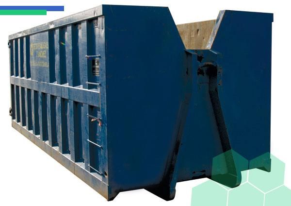 Un contenedor de basura azul se encuentra sobre una superficie blanca.