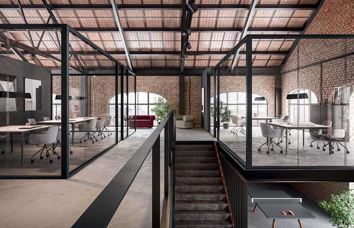 Bureau et salle de réunion derrière une cloison courbe en verre