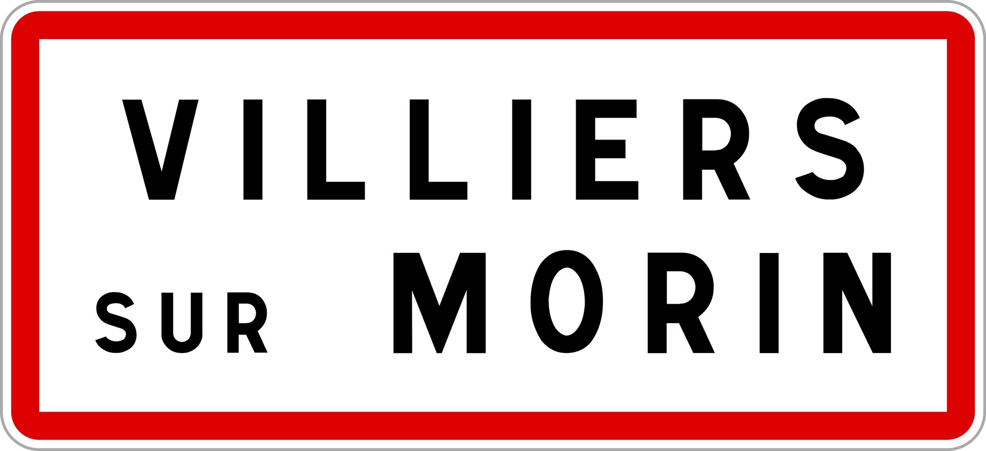 Panneau routier indiquant « VILLIERS SUR MORIN » en caractères noirs sur fond blanc avec bordure rouge