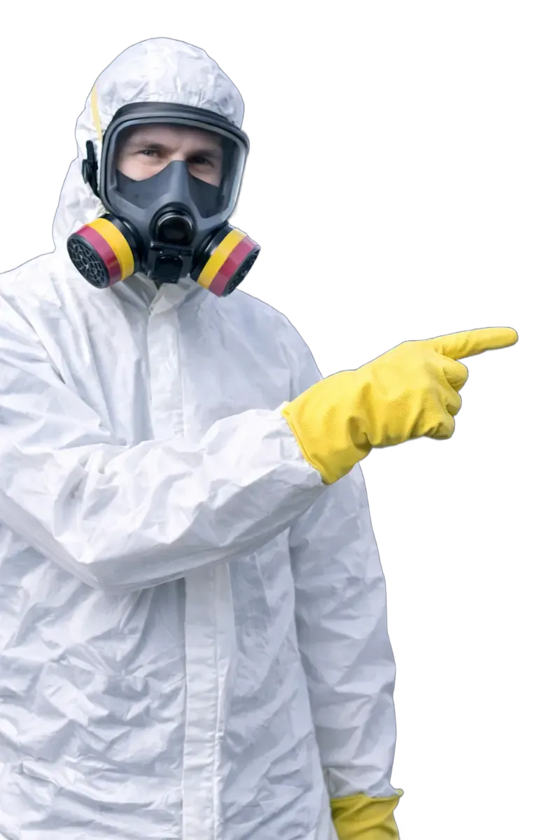 Un hombre con una camisa vaquera señala hacia un lado.