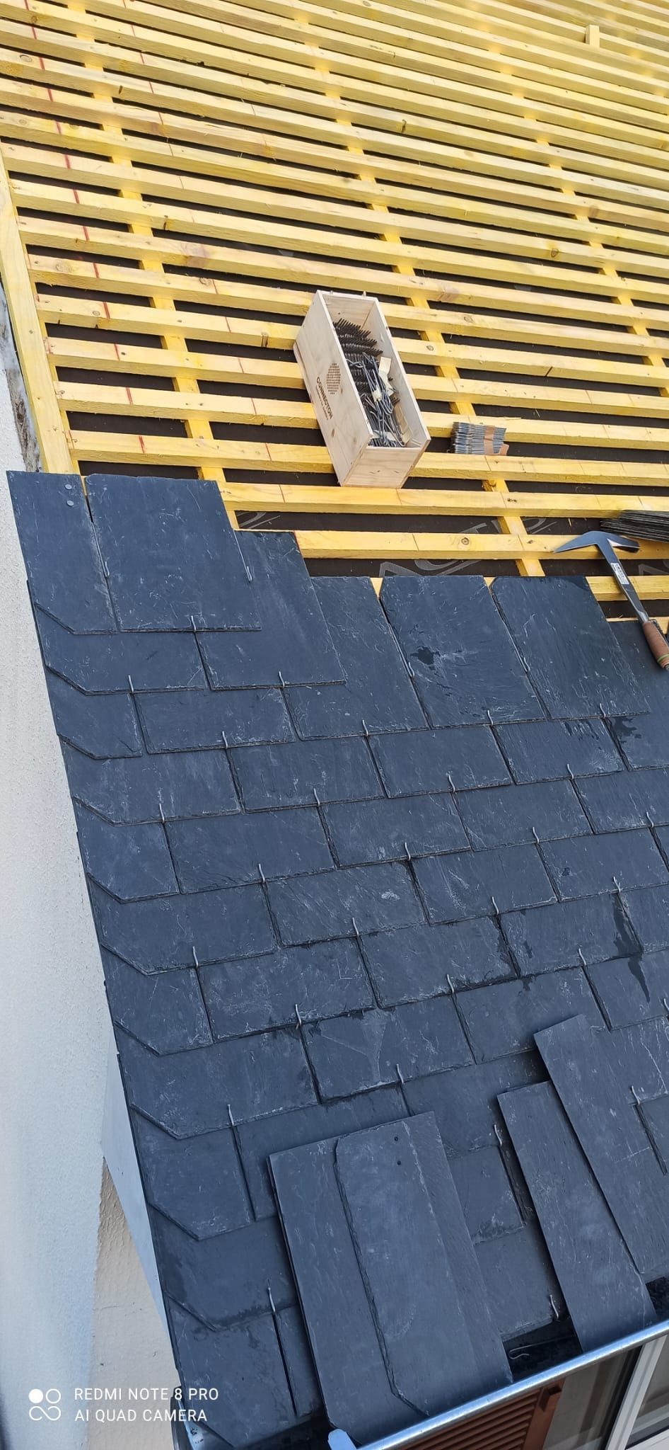 Rénovation d'une toiture en ardoises