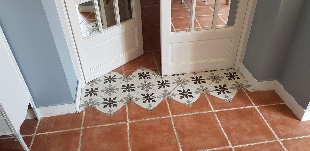 pose de carreaux de ciment