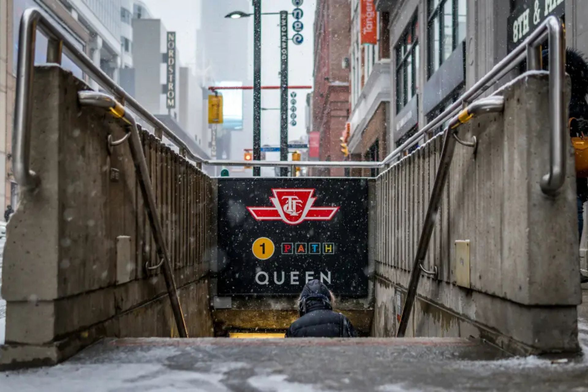 Entrance to Toronto’s PATH at Queen Station on a snowy winter day.