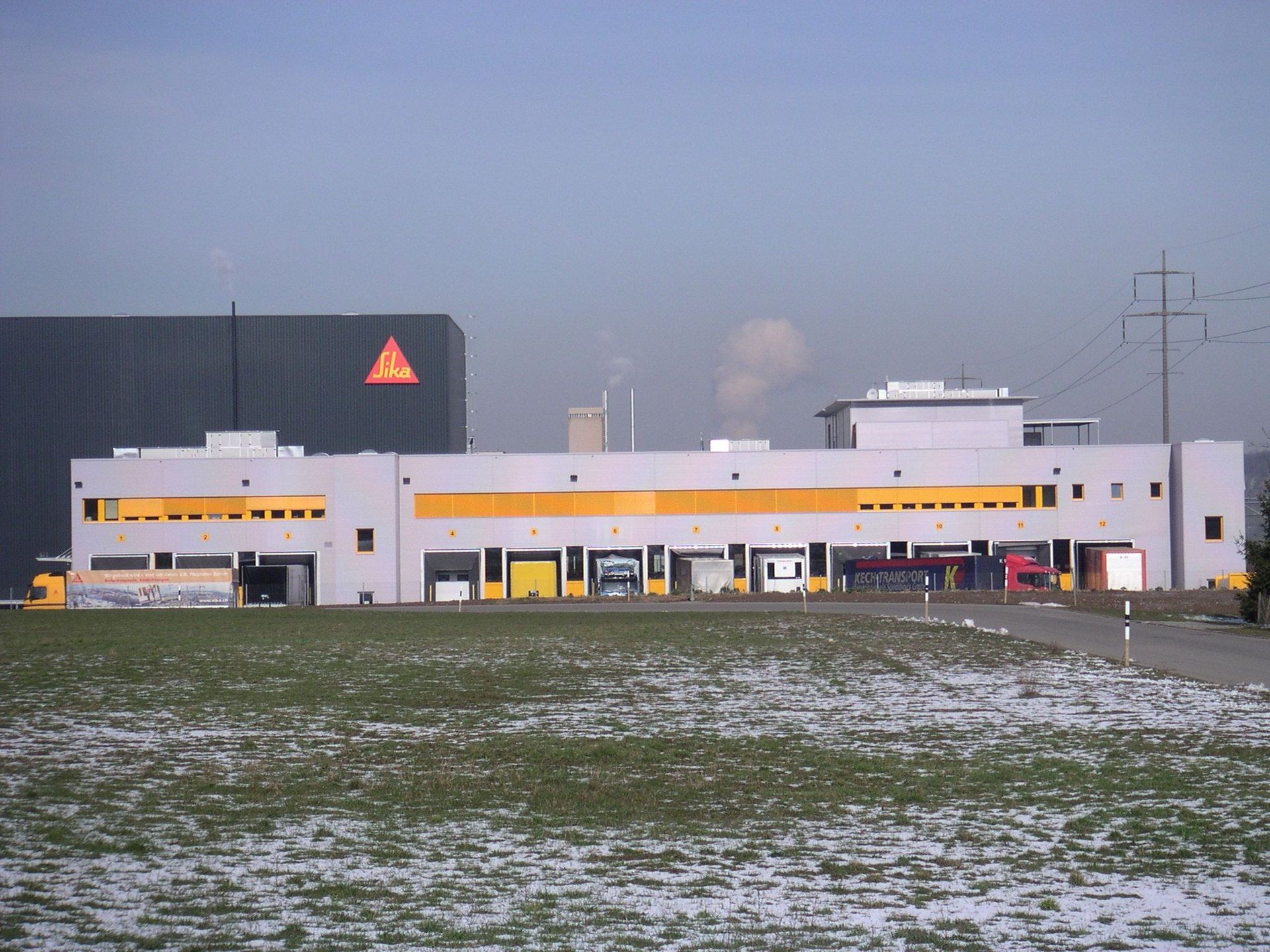 Neubau Logistikcenter Sika Schweiz AG Birr - K&K Fassaden AG