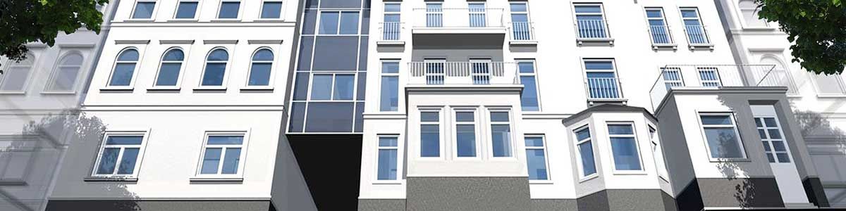 Ein Gebäude mit vielen Fenstern und Balkonen