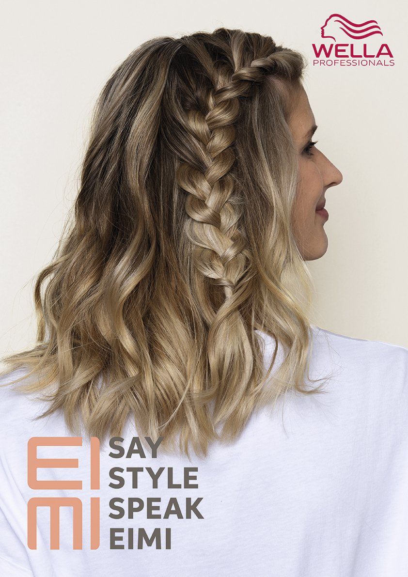 Frau mit frischem Haarschnitt von Salon Bellissima