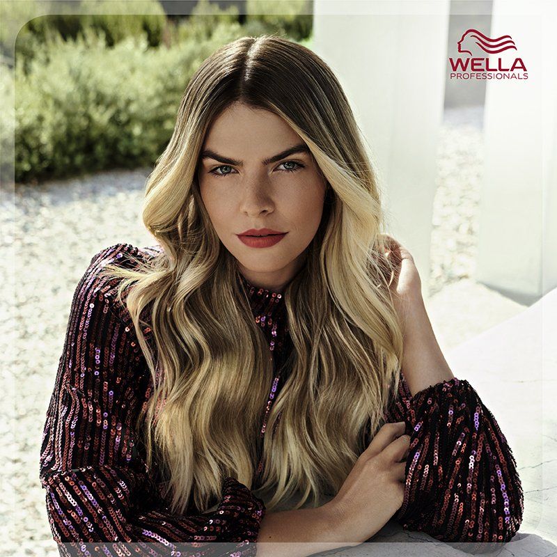 Frau mit frischem Haarschnitt von Salon Bellissima